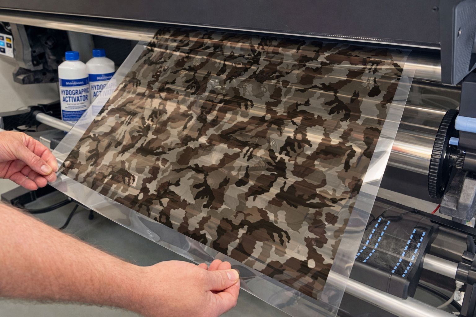 Close-up of hydrographic film with camouflage pattern used in water transfer printing.